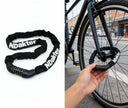 NDakter 130cm heavy-duty bike chain lock with 5-digit combination securing a bicycle to a city bike rack, featuring a protective fabric sleeve
