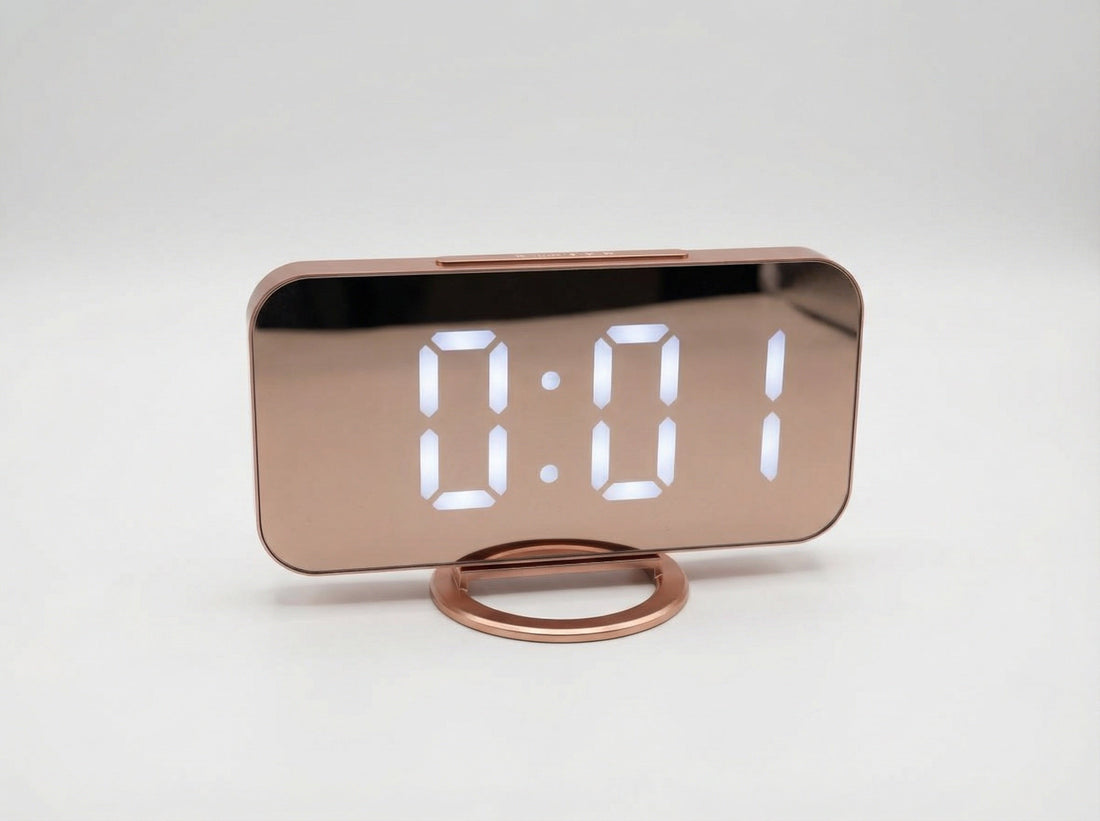 Modern, multifunctional alarm clock with a large mirror display, adjustable brightness, and USB charging.