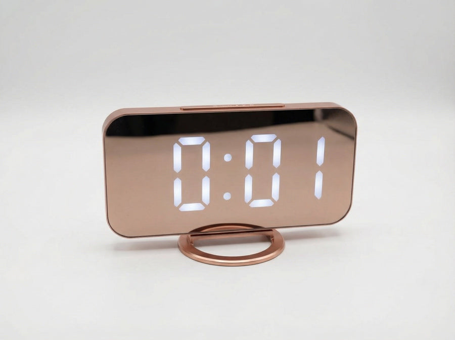 Modern, multifunctional alarm clock with a large mirror display, adjustable brightness, and USB charging.
