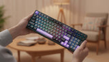 Wireless mechanical gaming keyboard by HOT PRICE featuring vibrant RGB backlighting and sleek design.