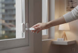 SanJie Wi-Fi home security alarm system with PIR detector, remote controls, and door/window sensor.