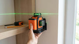 Takamine Tech3x360 3D Green laser level with 12 lines and self-leveling feature on a white background.