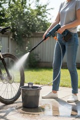 Portable HOT PRICE cordless pressure washer with nozzle and hose, showcasing compact design for easy outdoor cleaning.