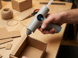 Cordless HOT PRICE hot glue gun with LED fast heating, 25W power, 2500mAh battery, including 22 glue sticks and a banana-shaped design.
