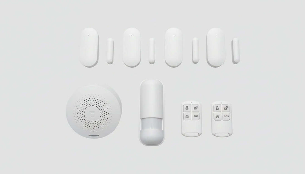 SanJie Home Security Alarm System with PIR detector, remote controls, and door window sensor, featuring TUYA app integration.