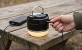 LED Camping Rechargeable Lamp by HOT PRICE, featuring a compact design with a bright light source for outdoor use.